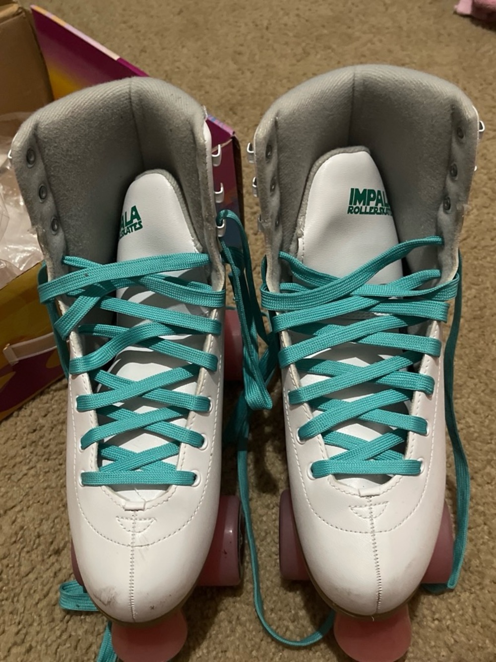 Impala White Roller Skates with Teal Laces